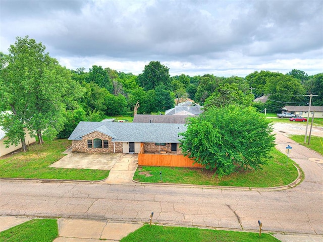 535 N Patchin Ave, Shawnee, OK 74801 - view of front facade featuring a front lawn and brick siding