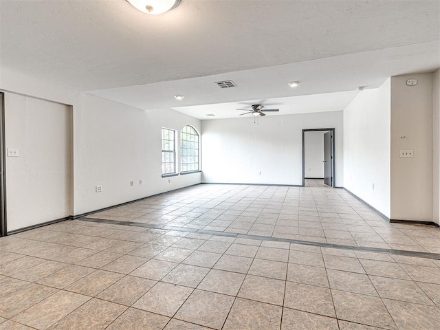 535 N Patchin Ave, Shawnee, OK 74801 - spare room with ceiling fan and light tile patterned floors
