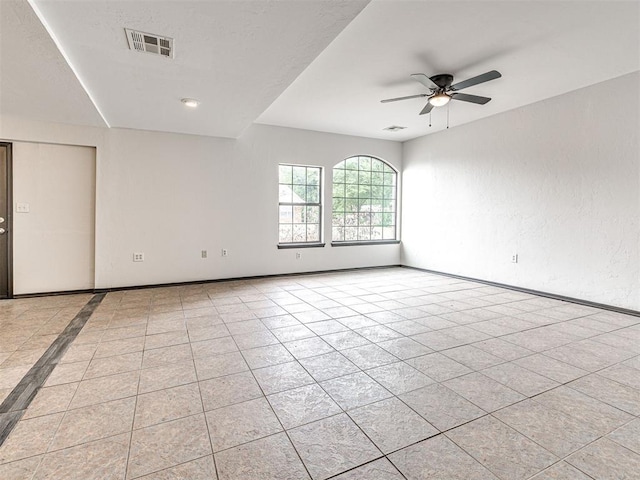 535 N Patchin Ave, Shawnee, OK 74801 - spare room with ceiling fan and light tile patterned floors