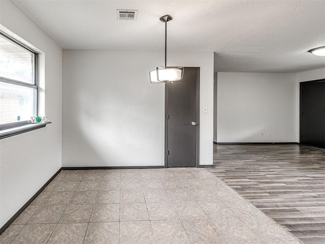 535 N Patchin Ave, Shawnee, OK 74801 - unfurnished room featuring a textured ceiling