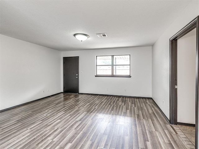 535 N Patchin Ave, Shawnee, OK 74801 - spare room with wood finished floors