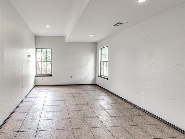 535 N Patchin Ave, Shawnee, OK 74801 - unfurnished room featuring recessed lighting, a textured wall, and light tile patterned flooring