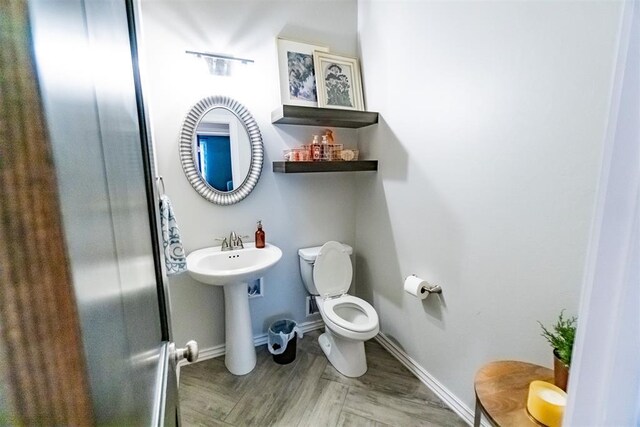 2713 Falling Leaves Dr, Weatherford, OK 73096 - half bath with toilet and baseboards