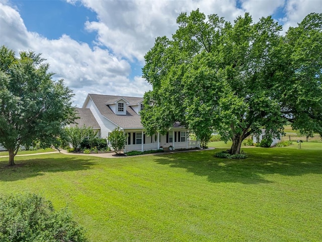 4919 E Lone Chimney Rd, Glencoe, OK 74032 - cape cod home with covered porch and a front lawn