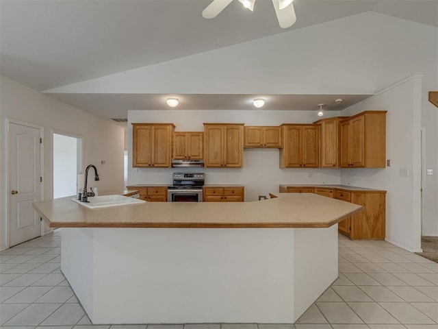4919 E Lone Chimney Rd, Glencoe, OK 74032 - kitchen featuring stainless steel electric range, lofted ceiling, under cabinet range hood, light tile patterned flooring, and a large island