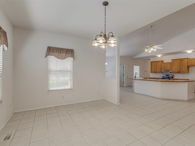 4919 E Lone Chimney Rd, Glencoe, OK 74032 - kitchen with vaulted ceiling, ceiling fan, stainless steel electric range oven, decorative light fixtures, and a chandelier