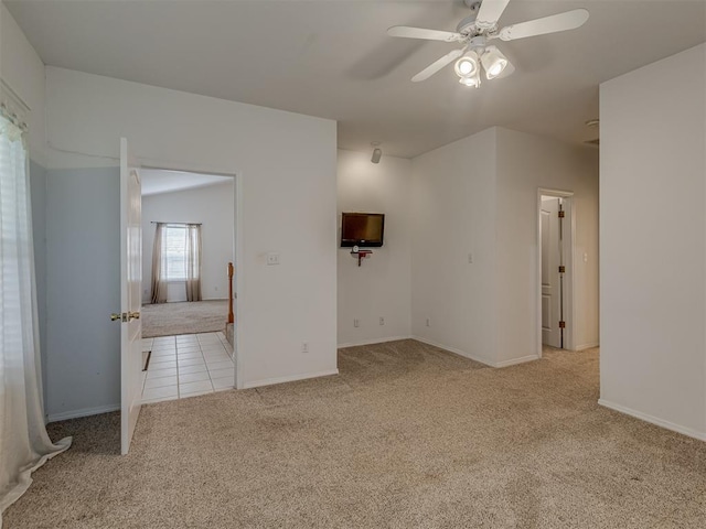4919 E Lone Chimney Rd, Glencoe, OK 74032 - unfurnished room featuring light colored carpet, ceiling fan, and light tile patterned floors