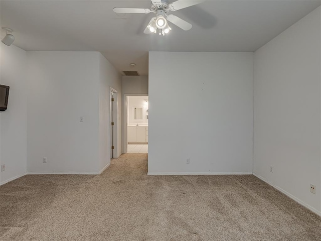 4919 E Lone Chimney Rd, Glencoe, OK 74032 - spare room with light carpet and ceiling fan