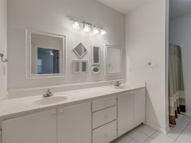4919 E Lone Chimney Rd, Glencoe, OK 74032 - full bath featuring double vanity, tile patterned floors, and a shower with curtain