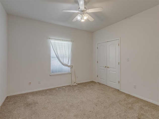 4919 E Lone Chimney Rd, Glencoe, OK 74032 - spare room with carpet and a ceiling fan