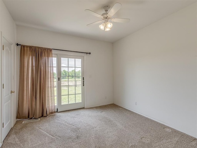4919 E Lone Chimney Rd, Glencoe, OK 74032 - unfurnished room featuring carpet floors and ceiling fan