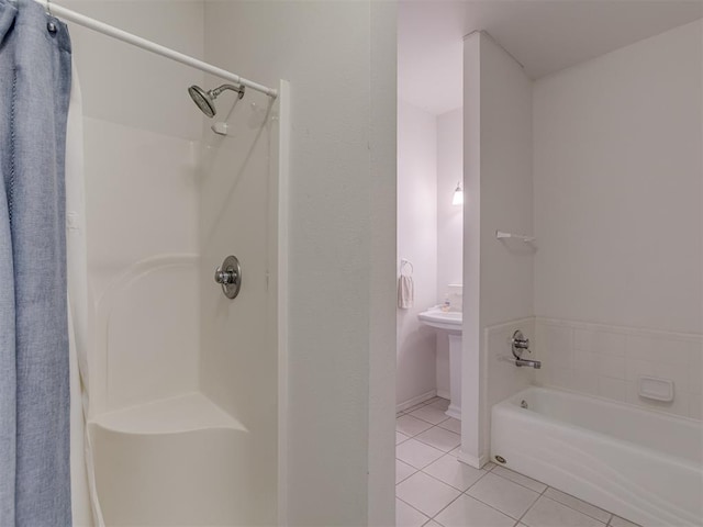 4919 E Lone Chimney Rd, Glencoe, OK 74032 - bathroom with tile patterned floors, curtained shower, and a bath