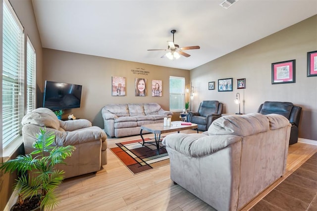 1609 NW 144th Ter, Edmond, OK 73013 - living area featuring ceiling fan, healthy amount of natural light, light wood-type flooring, and lofted ceiling