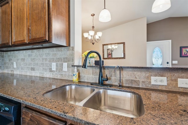 1609 NW 144th Ter, Edmond, OK 73013 - kitchen with brown cabinets, vaulted ceiling, dark stone counters, decorative backsplash, and dishwasher