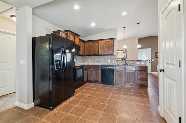 1609 NW 144th Ter, Edmond, OK 73013 - kitchen with black appliances, lofted ceiling, decorative backsplash, decorative light fixtures, and a peninsula