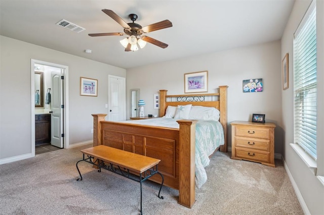 1609 NW 144th Ter, Edmond, OK 73013 - bedroom featuring carpet, ceiling fan, and connected bathroom