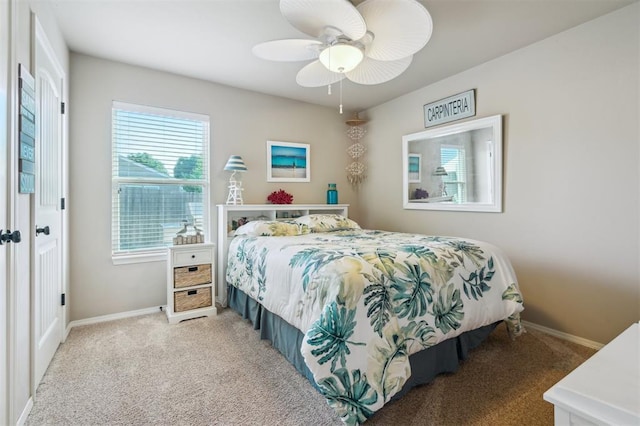1609 NW 144th Ter, Edmond, OK 73013 - carpeted bedroom with baseboards and ceiling fan