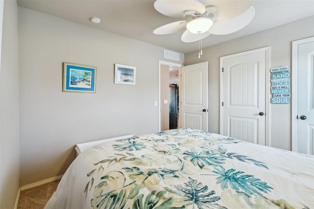 1609 NW 144th Ter, Edmond, OK 73013 - carpeted bedroom featuring baseboards and ceiling fan
