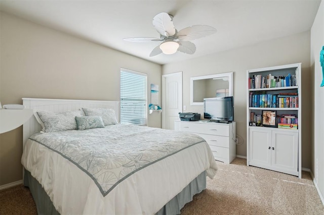 1609 NW 144th Ter, Edmond, OK 73013 - bedroom with light carpet and ceiling fan