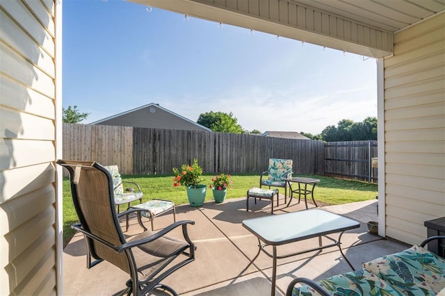 1609 NW 144th Ter, Edmond, OK 73013 - fenced backyard with a patio area