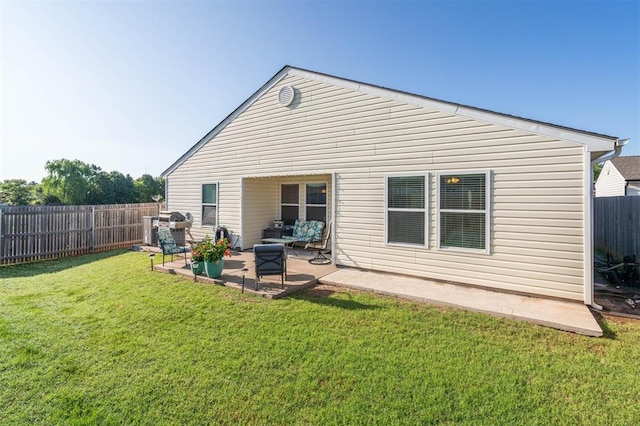 1609 NW 144th Ter, Edmond, OK 73013 - back of house featuring a fenced backyard and a patio