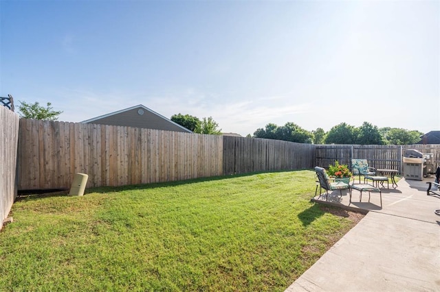 1609 NW 144th Ter, Edmond, OK 73013 - fenced backyard featuring a patio