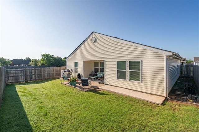 1609 NW 144th Ter, Edmond, OK 73013 - back of house with a fenced backyard and a patio area