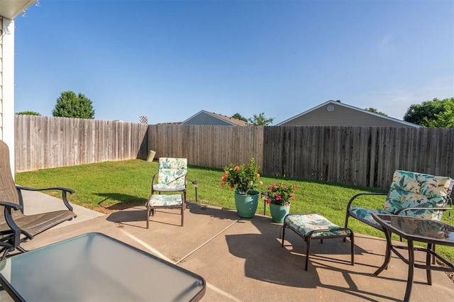 1609 NW 144th Ter, Edmond, OK 73013 - fenced backyard featuring a patio area