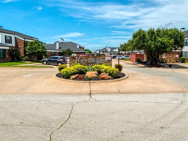 3003 River Oaks Dr Unit 119, Norman, OK 73072 - view of asphalt road with a residential view