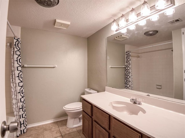 3003 River Oaks Dr Unit 119, Norman, OK 73072 - bathroom with vanity, tile patterned flooring, shower / bath combo, and a textured ceiling