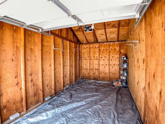 3003 River Oaks Dr Unit 119, Norman, OK 73072 - garage featuring a garage door opener