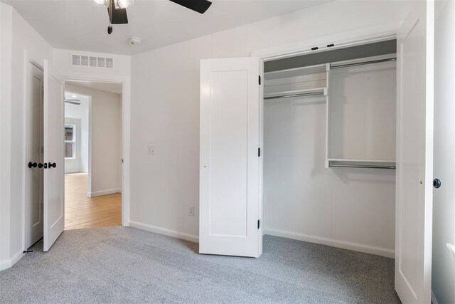 3825 NW 176th St, Edmond, OK 73012 - unfurnished bedroom featuring carpet, a closet, and ceiling fan
