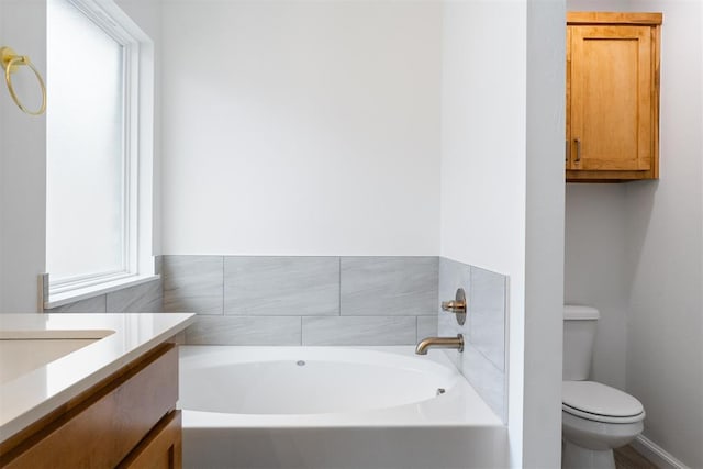 3825 NW 176th St, Edmond, OK 73012 - full bath with healthy amount of natural light, a garden tub, and vanity