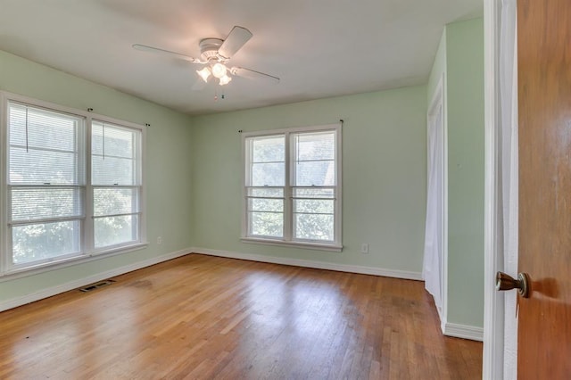 5932 N Grove Ave, Oklahoma City, OK 73122 - unfurnished room featuring wood finished floors and a ceiling fan