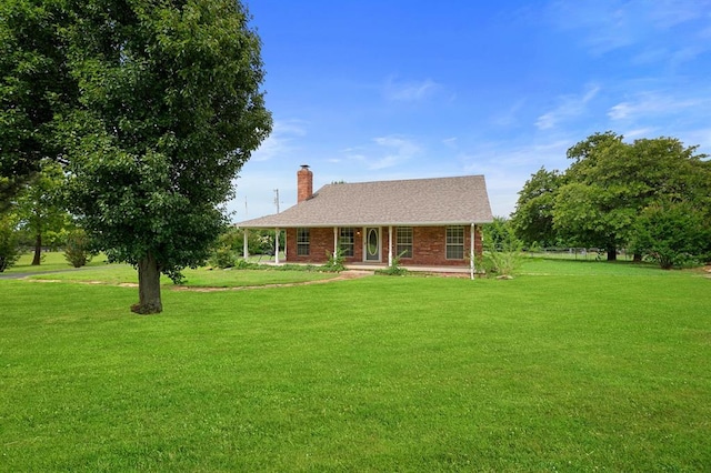 813 N Council Rd Unit S, Newcastle, OK 73065 - view of front of property with a chimney, a front lawn, a porch, and brick siding