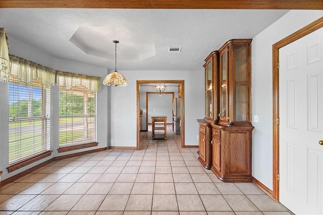 813 N Council Rd Unit S, Newcastle, OK 73065 - dining area featuring light tile patterned flooring and a raised ceiling