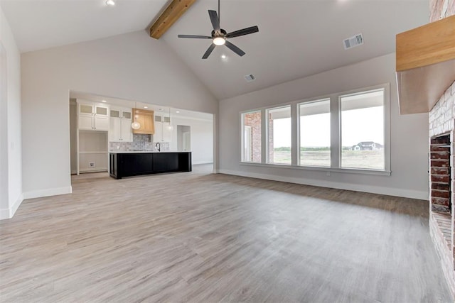 4163 Hawthorne St, Piedmont, OK 73078 - unfurnished living room with beam ceiling, high vaulted ceiling, ceiling fan, light wood finished floors, and recessed lighting