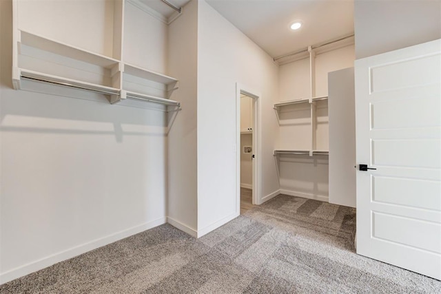 4163 Hawthorne St, Piedmont, OK 73078 - spacious closet featuring carpet flooring