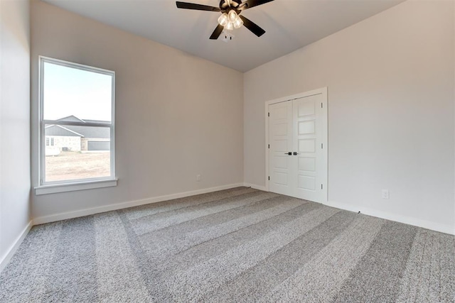 4163 Hawthorne St, Piedmont, OK 73078 - carpeted empty room featuring a ceiling fan and baseboards