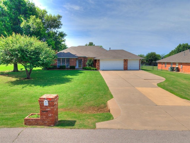 1204 Scrambler Ln, Edmond, OK 73025 - ranch-style home with driveway, an attached garage, and brick siding