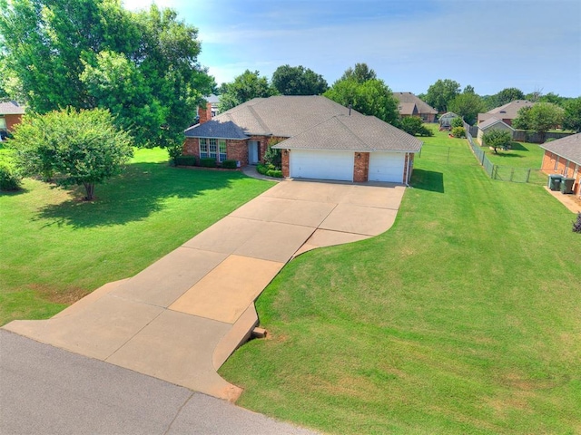 1204 Scrambler Ln, Edmond, OK 73025 - view of front of property with driveway, a garage, a chimney, and brick siding