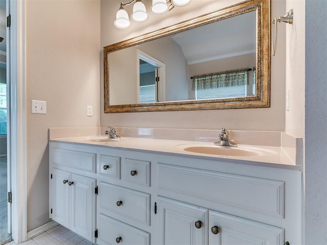 1204 Scrambler Ln, Edmond, OK 73025 - bathroom featuring double vanity and tile patterned flooring