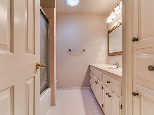 1204 Scrambler Ln, Edmond, OK 73025 - full bathroom featuring vanity, tile patterned flooring, and enclosed tub / shower combo