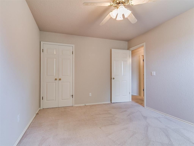 1204 Scrambler Ln, Edmond, OK 73025 - unfurnished bedroom with light colored carpet and ceiling fan
