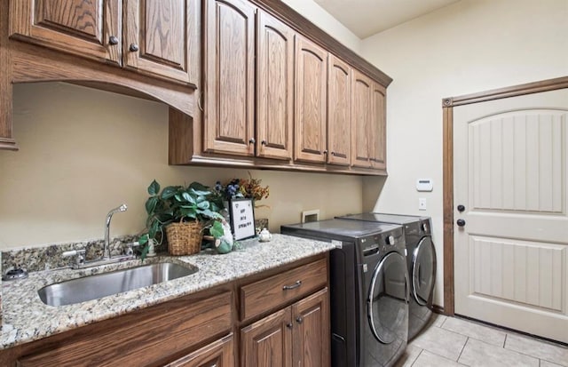 7732 Jesse Trl, Oklahoma City, OK 73150 - laundry room with cabinet space, independent washer and dryer, and light tile patterned flooring