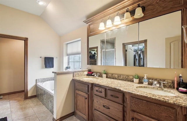 7732 Jesse Trl, Oklahoma City, OK 73150 - bathroom with vaulted ceiling, double vanity, a bath, tile patterned flooring, and a shower stall
