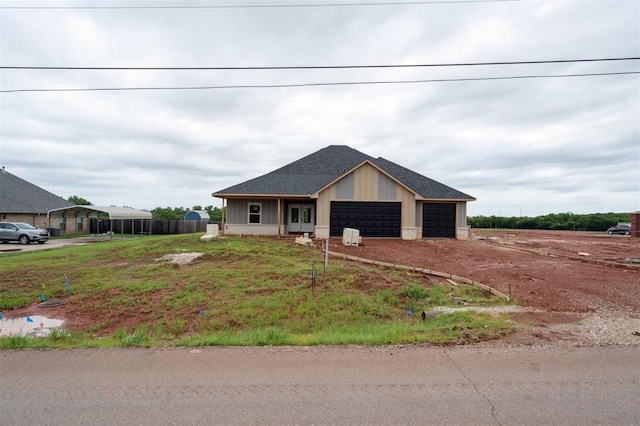 41364 Hazel Dell Rd, Shawnee, OK 74804 - view of front of home with driveway, a garage, and roof with shingles