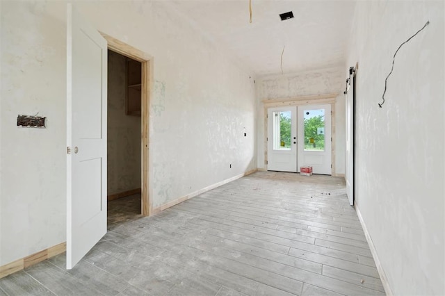 41364 Hazel Dell Rd, Shawnee, OK 74804 - unfurnished room with light wood-type flooring and french doors