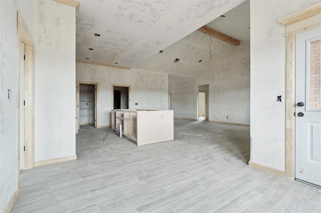 41364 Hazel Dell Rd, Shawnee, OK 74804 - empty room featuring high vaulted ceiling, beamed ceiling, and light wood finished floors