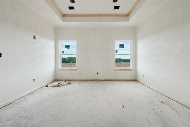 41364 Hazel Dell Rd, Shawnee, OK 74804 - empty room featuring a tray ceiling, healthy amount of natural light, and ornamental molding
